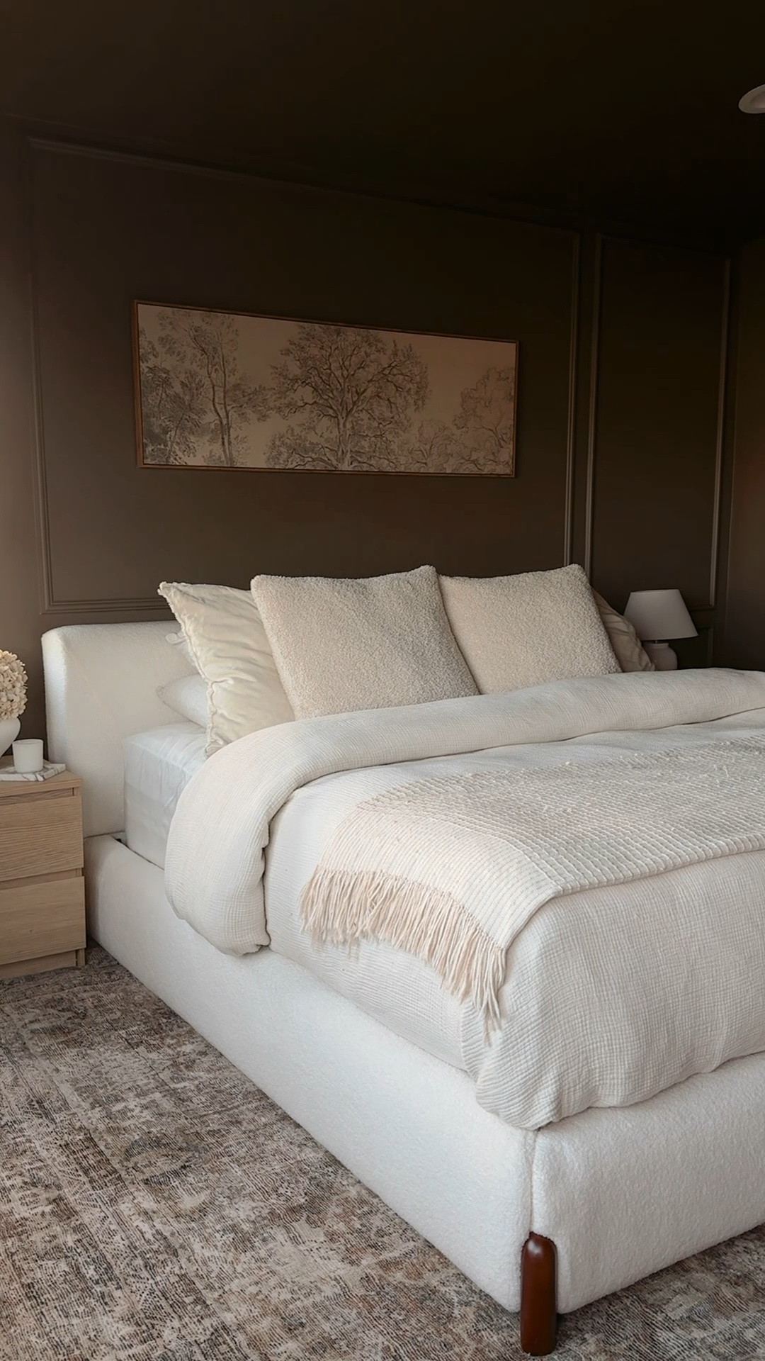 Welcome to day one of creating our dream primary bedroom!🤎

We’re saying goodbye to the sad beige aesthetic and hello to a moody, tranquil space.

I color drenched the entire room in a deep chocolate brown, and let me tell you, painting our vaulted ceiling was an intense upper body workout but completely worth it!

Next, it was time to upgrade our furniture. I immediately fell in love with this beautiful bed from @alivinghomeoffical as soon as I saw it online - between the luxe sherpa fabric, low profile, and Japandi design, it looks & feels so high end without the designer price tag. 

This space feels so warm and inviting now. I cannot get over this transformation so far, and we’re just getting started. Stay tuned for part 2!built my dream bed from @alivinghomeoffical 🤍

Upgrading to a low-profile, Japandi-inspired minimalist bed has completely transformed my space. The room now feels instantly calm and tranquil the moment you step in. The sherpa bed frame, natural tones, and solid wood legs make this bed a perfect choice. It's not only visually stunning but also incredibly sturdy and crafted with high-quality materials, built to last. It’s more than just furniture—it’s a mood. Absolutely worth the investment!☁️
.
.
.

#PrimaryBedroom #BedroomMakeover #HomeTransformation #MoodyInteriors #JapandiDesign #SherpaFurniture #NeutralHomeDecor #ModernInterior #InteriorInspo #HomeDecorLover #VaultedCeilings #DIYHomeDecor #DreamBedroom #MoodyBedroom #HomeStyling #ChocolateBrownInteriors #FurnitureUpgrade #TranquilSpace #JapandiStyle #CozyVibes #RoomTransformation #InteriorStyling #ModernAesthetic #NeutralInteriors #HomeDesignInspiration
