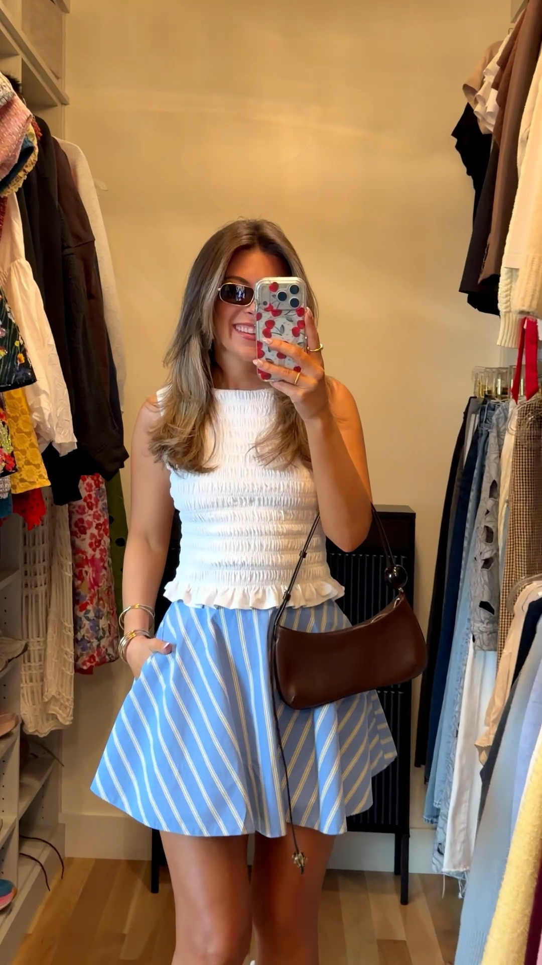 Abercrombie blue striped skort paired with a white smocked top casual everyday look for spring

Vici code: Emerson30

Wearing small top xs skort

Causal
Comfy
Spring outfit
Lunch date
Shopping
Mom look
Workwear

#LTKWorkwear #LTKootd #LTKSeasonal