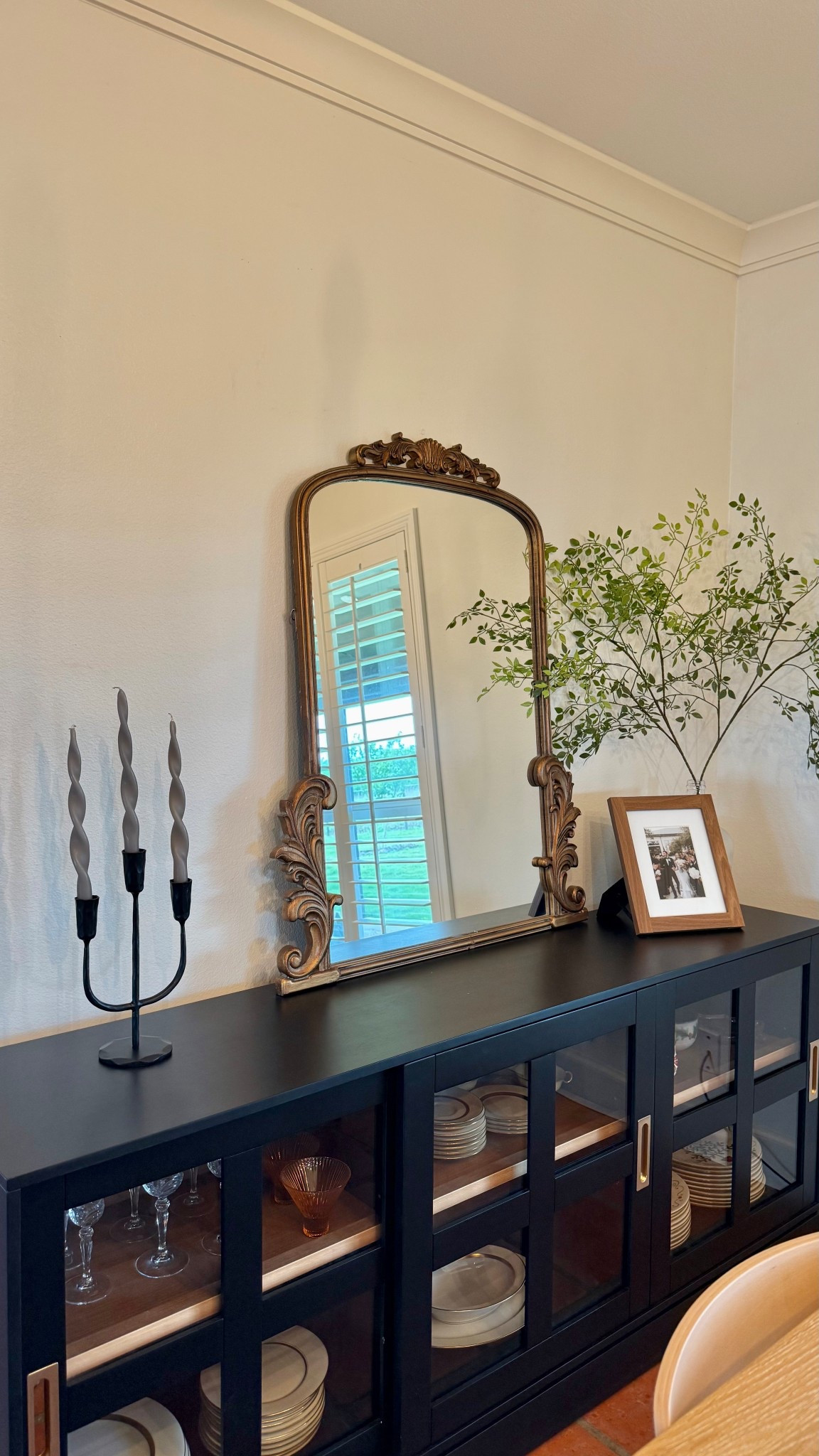 Loving these candlesticks I found! They give a unique look compared to just the typical white color! #homedecor #candlesticks #candleabra #buffettable #consoletable #goldmirror 

#LTKHome #LTKFamily