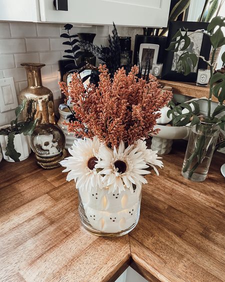 DIY Ghost peeps lit vase! 👻
I thrifted a large round vase and placed a small vase in the center with twinkle lights and this fall flower arrangement! Everything linked! I would suggest thrifting vases because for the 2 of them I only spent $3 😳 

#LTKHalloween #LTKHoliday #LTKSeasonal