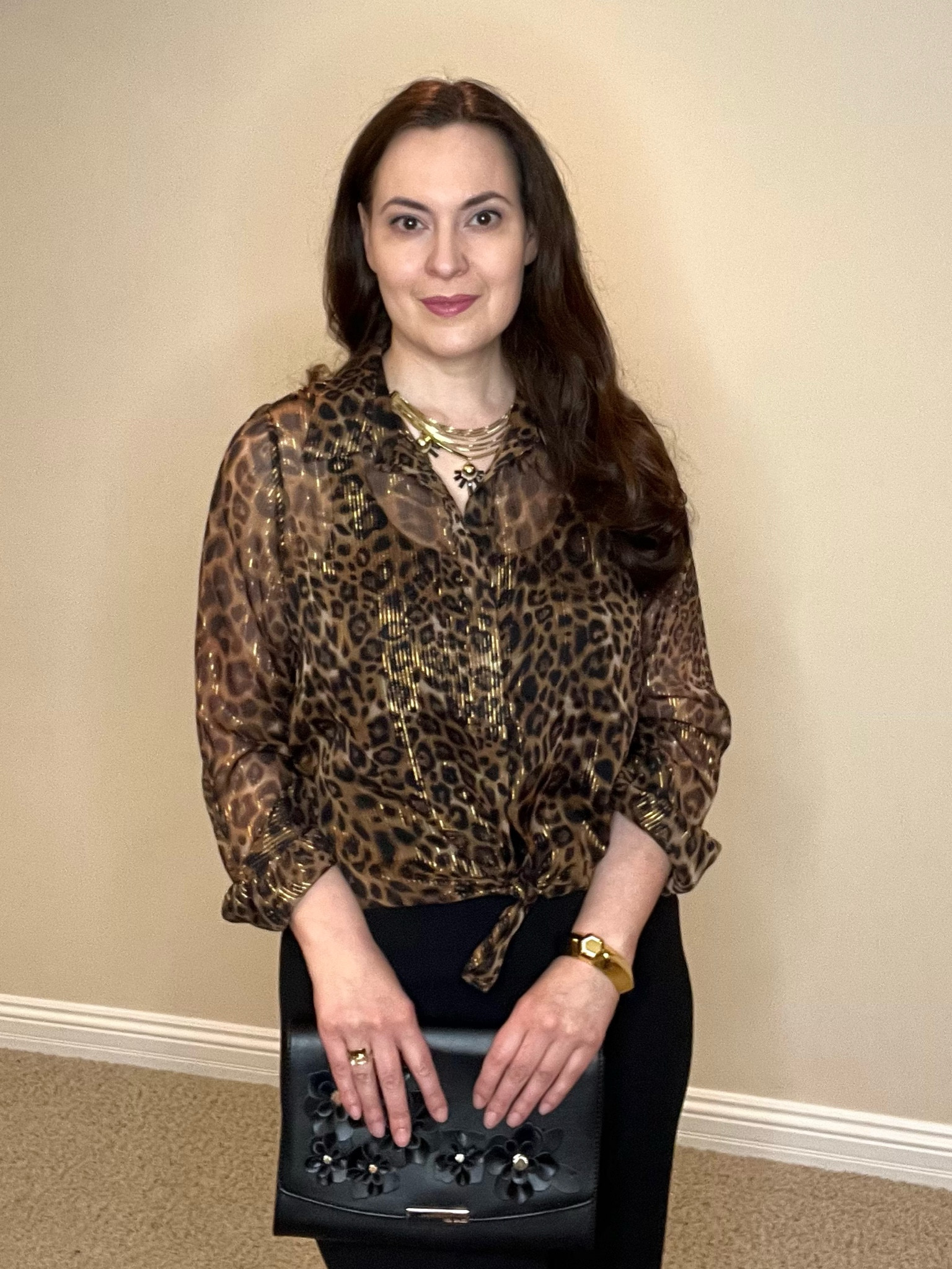 Loving this leopard/cheetah print blouse. It’s sheer and has some gold thread throughout giving it some shine - wear with pants, jeans, or a skirt. 

#LTKOver40 #LTKSaleAlert #LTKHoliday