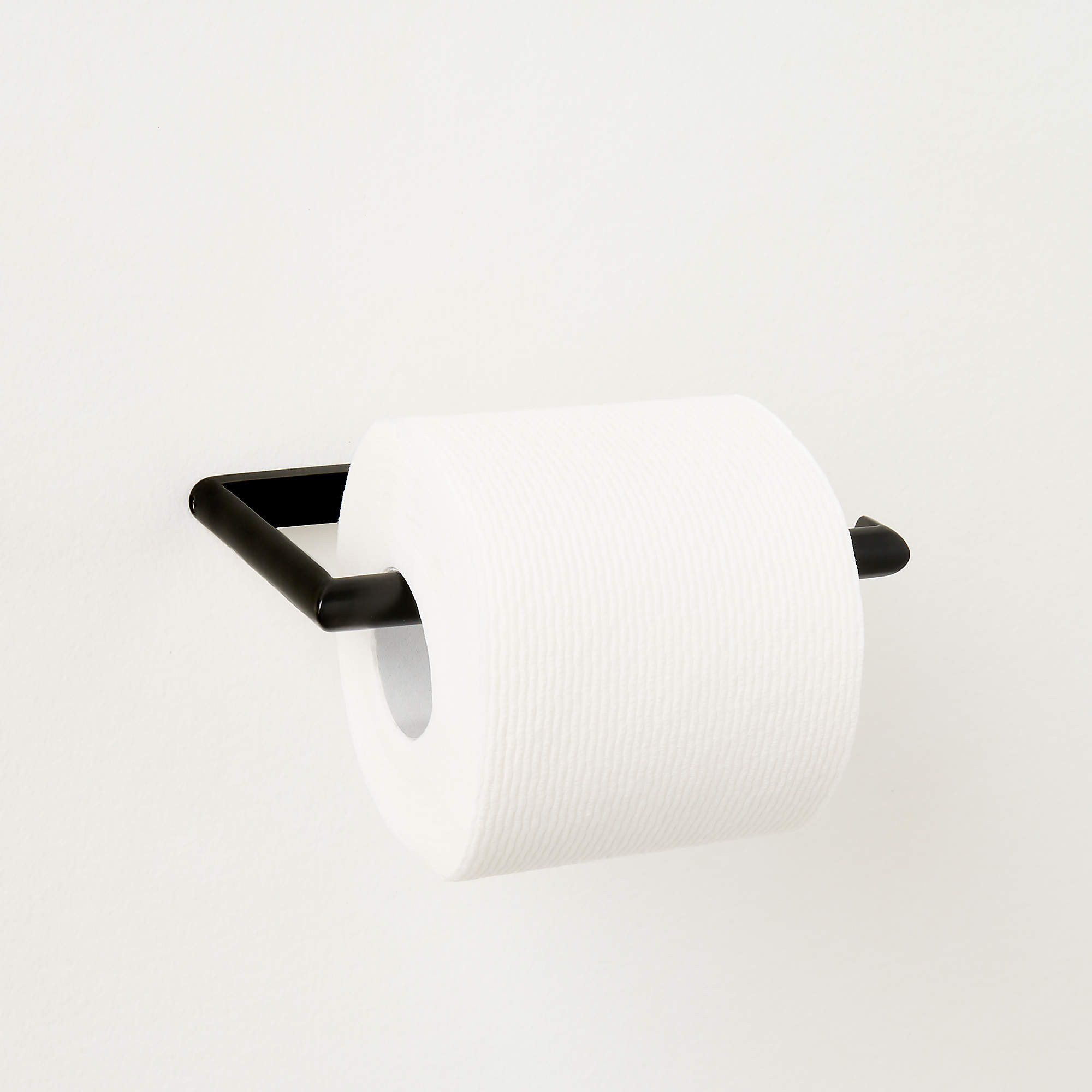 Curveaux Curved Matte Black Wall-Mounted Toilet Paper Holder + Reviews | CB2 | CB2