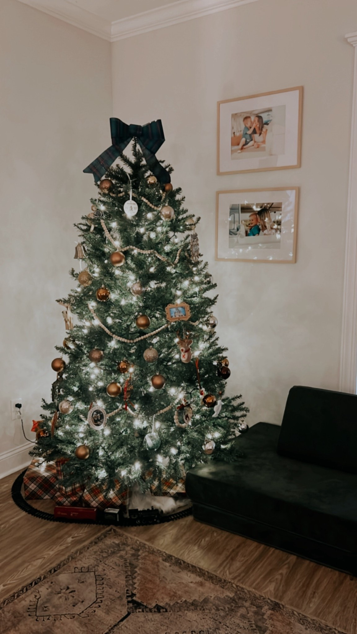 last years Christmas tree 🎄 the perfect mix of aesthetic christmas meets keepsake christmas ornaments ♥️ there’s definitely some colorful ones around the back 😂  

christmas tree | christmas | christmas decor | christmas aesthetic | christmas train | train for christmas tree | gold christmas decor | affordable christmas decor | walmart | amazon | cozy view | winter cozy  

#LTKSeasonal #LTKGiftGuide #LTKHoliday