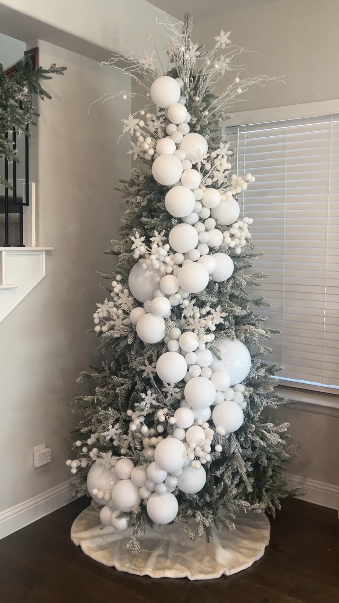 White clustered flocked Christmas tree from king of Christmas! Neutral Christmas decor, holiday tree, decorate with me, ornaments, white ornaments, tree picks, tree topper

✨I used 5 boxes of mini 6mm ornaments, 1 box of the 4” ornaments, 4 boxes of 6” ornaments, and 3 jumbo 10” ornaments#LTKVideo 

#LTKHoliday #LTKHome