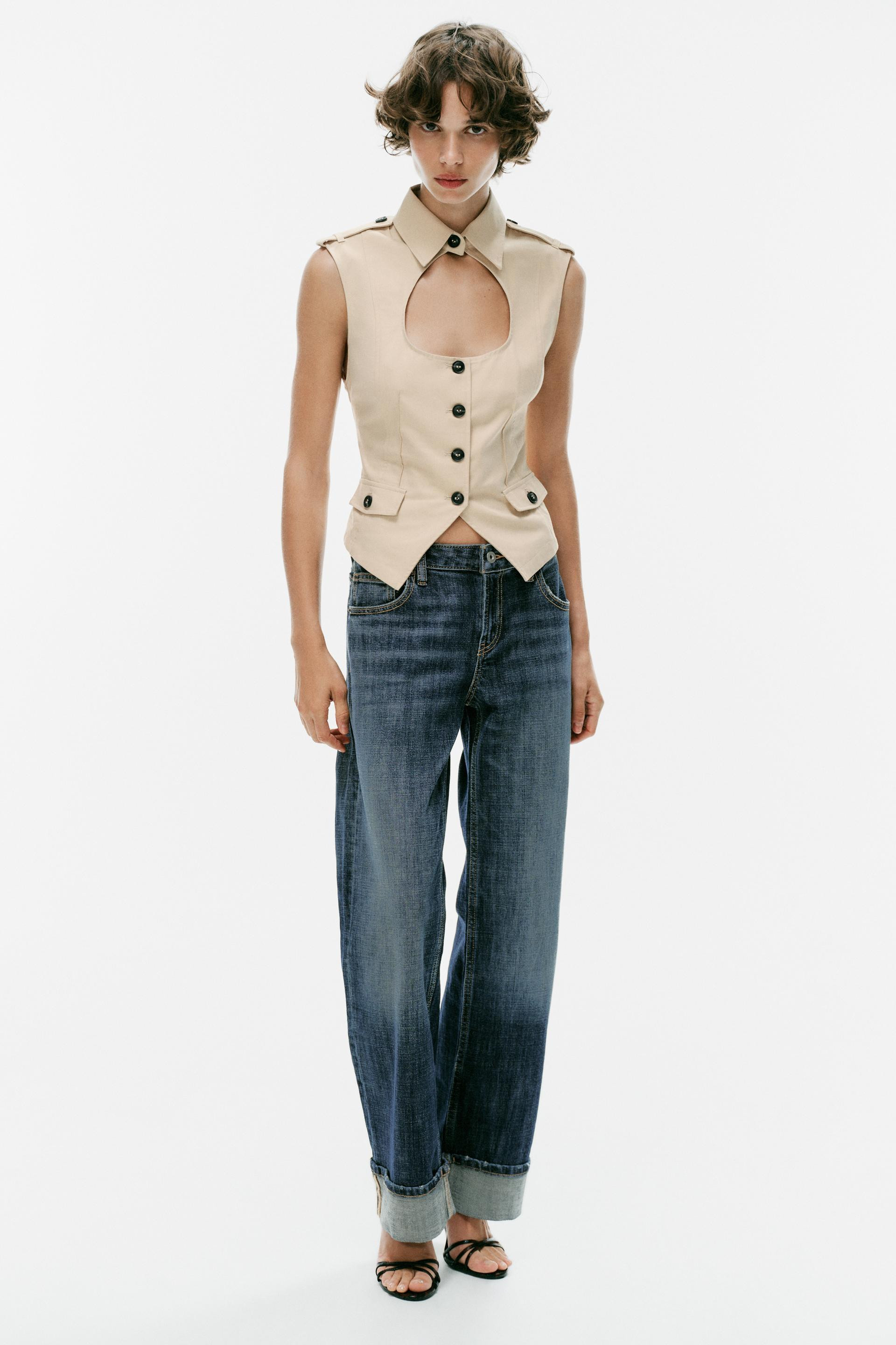 Gr\u00f6\u00dfe des Models: 176 cmTop mit Reverskragen, Schlitz und Knopf. \u00c4rmellose Schulte... | Zara DE