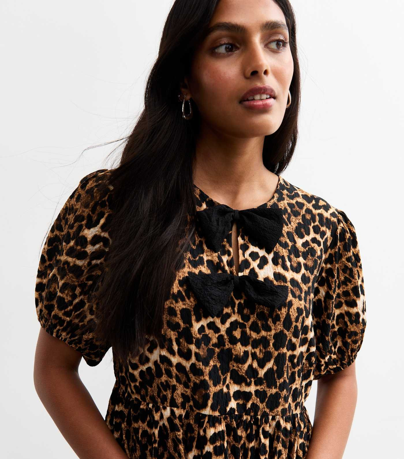 Brown Leopard Print Bow Detail Mini Dress
						
						Add to Saved Items
						Remove from Saved... | New Look (UK)