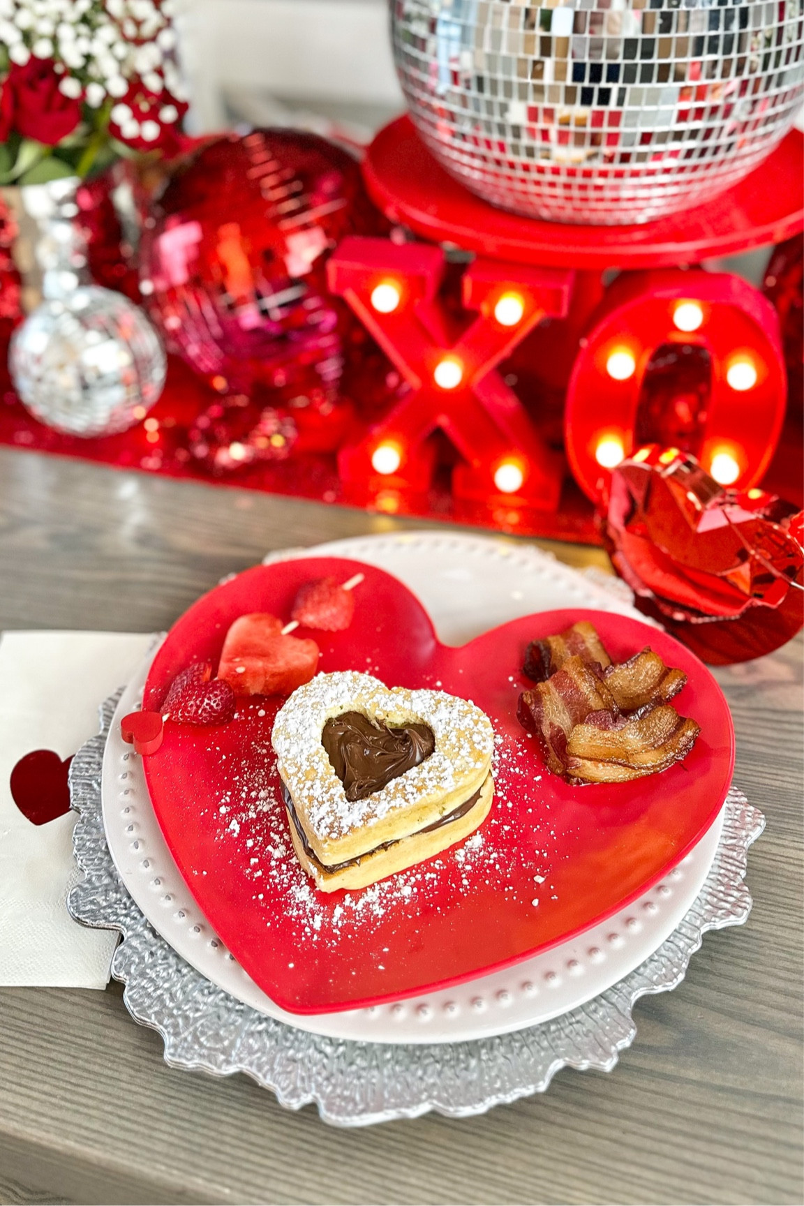 Valentine’s Day breakfast with heart-shaped pancakes, cinnamon roll waffles, bacon and more.

#LTKHome #LTKSeasonal #LTKParties