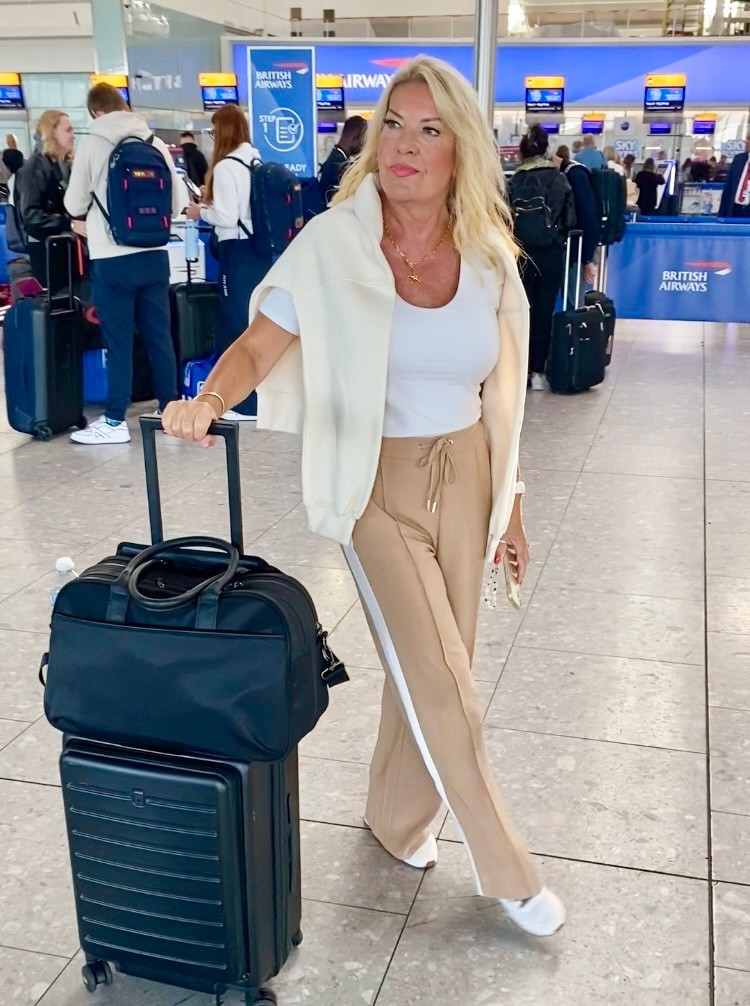 An easy, comfy and stylish travel outfit. Loose, wide leg sporty-style trousers and breathable fabrics which can be layered. 
Wearing Medium trousers. Adore the colour too - why not have a touch of chic at the airport?! 

#LTKTravel #LTKStyleTip #LTKActive