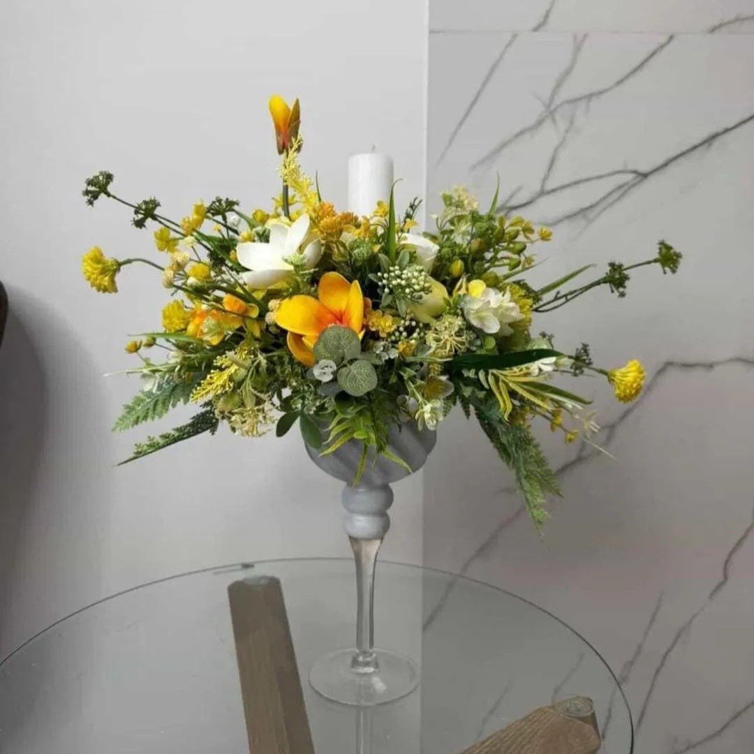 Freshen up your space with this elegant spring floral centerpiece by Lozynka. Designed with realistic artificial blooms and lush greenery, this handmade arrangement sits in a classic glass vase to create a bright, welcoming focal point for your dining table or kitchen island. It’s a beautiful way to bring the look of fresh flowers into your home year-round while adding soft seasonal charm to your decor.

#LTKHome #SpringTable #FloralArrangement #HomeDecorInspo #SeasonalDecor #TableStyling #SpringDecor #ArtificialFlowers

#LTKWedding #LTKHome #LTKSeasonal