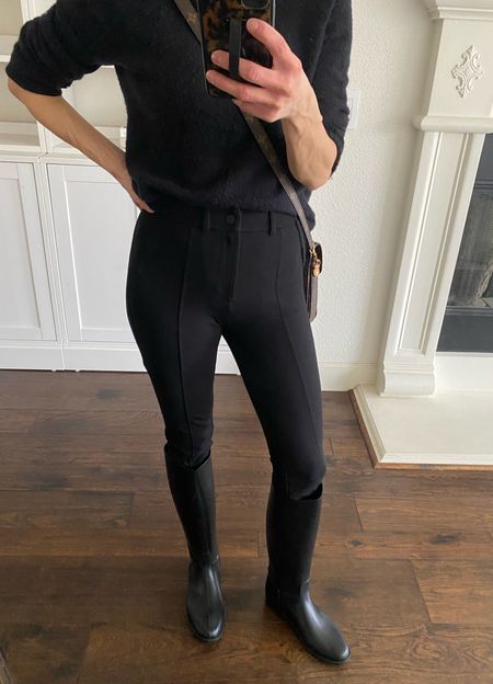 Black fitted ponte pants. I’m in love with these! They fit like a glove and have a nice high waist. They are on major sale right now. I actually went down a size to have them look more like a riding pant. I’m wearing the 00 here. 

Black equestrian rain boots. These are so chic and under $100. Make sure you go down a full size. They run very small and are narrow. I’m normally a 7.5 and have these in an 8.5

Equestrian outfit 
Refined rain boots





#LTKshoecrush #LTKstyletip #LTKover40
