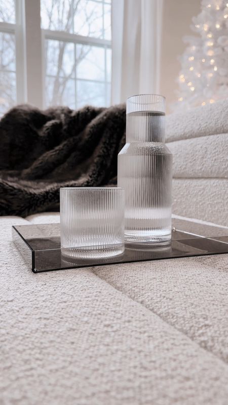 I love incorporating things like water carafes to make my home feel luxe and extra. Obsessed with this ribbed carafe and cup set from Amazon. Such a pretty and aesthetic find. I also grabbed this smoked acrylic tray from Amazon as well (I got the 12x8 size for reference!)

Aesthetic Amazon finds, aesthetic home, water Carafe, luxe look for less, luxe home 

#LTKhome #LTKfindsunder100
