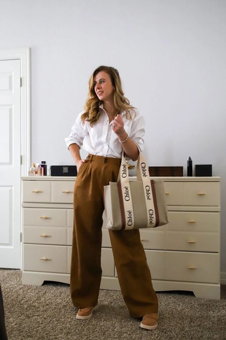 Brown pants with a white button up for a classic look

#LTKSeasonal #LTKfindsunder100 #LTKstyletip