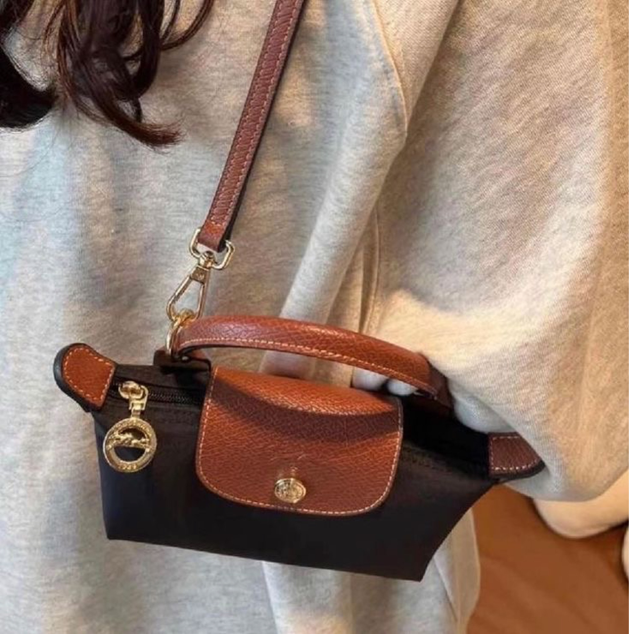I did not know this incredible trick for the Longchamp Le Pliage pouch and I’m so shocked and impressed!!!! Ordering bag straps ASAP and turning my pouch into a bag!!!!  #longchamp #lepliage #lepliagepouch #bagtrick

#LTKstyletip #LTKunder100 #LTKitbag