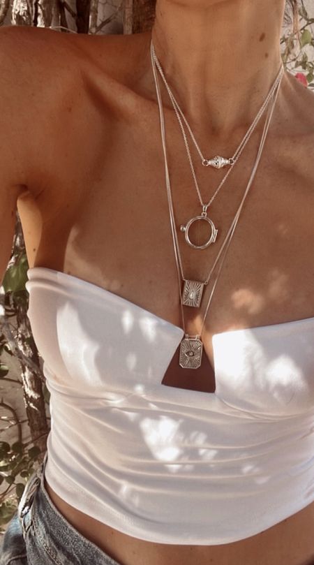 Summer is for layering necklaces and this is my new go-to summer layers. They look good with everything! From pool to party. Comes in gold or silver  

#LTKStyleTip #LTKSeasonal #LTKTravel