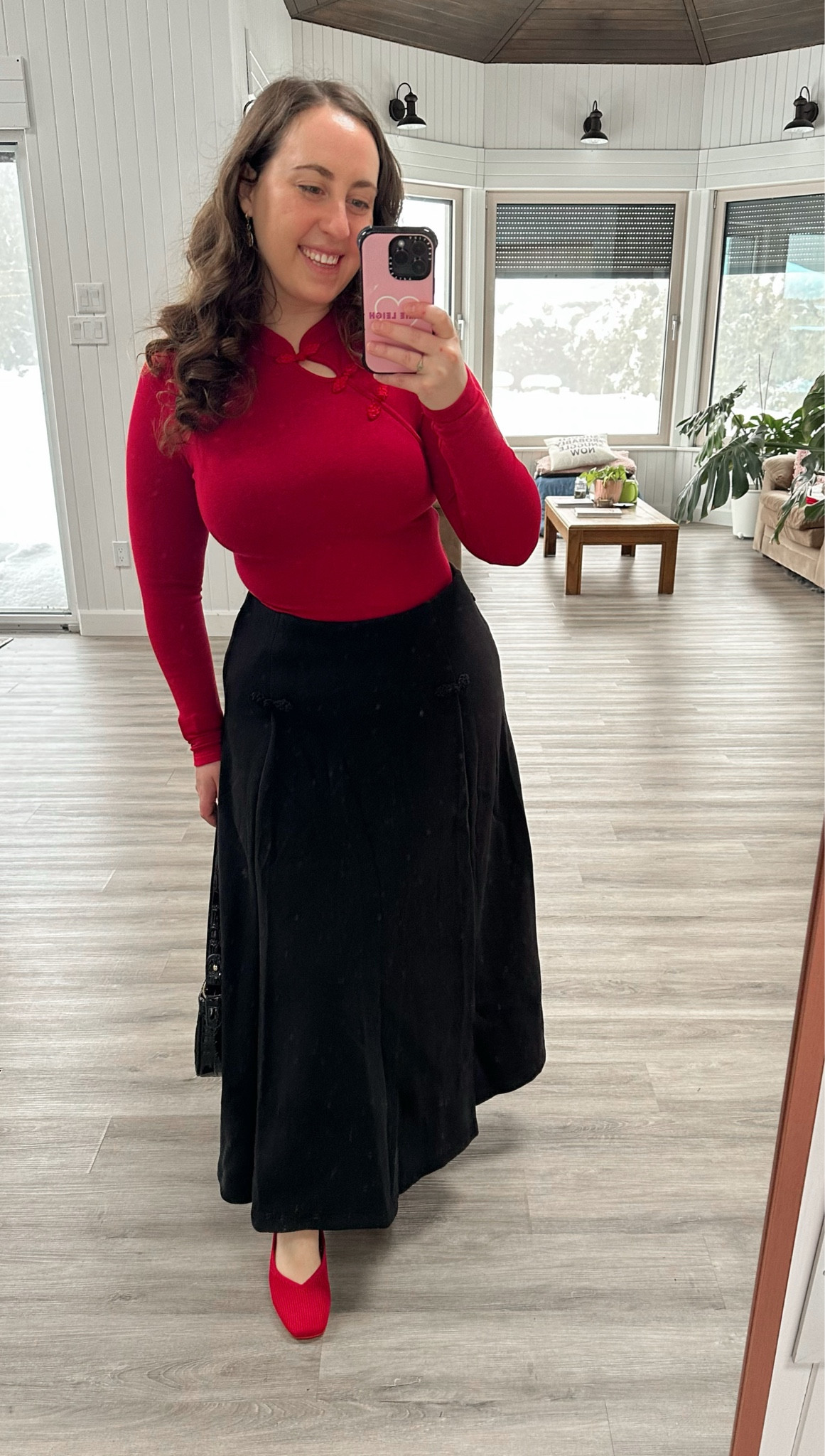 I absolutely adore this top! This brami is from the new lunar new year collection from OGL and I think it is so cute! I love the mandarin collar and asymmetrical frog button details. It was available in black and white as well, but I love this vibrant red shade! The built in shelf bra with removable padding offers support + smoothing without the need for a bra. I love it paired with this wool-like maxi skirt from the same collection, but it would be great with dress pants or other skirts as well! 

#LTKWorkwear #LTKSeasonal #LTKootd