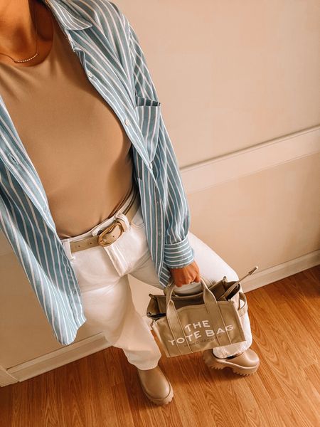 Spring style, summer style, office style, blue striped button down, Marc Jacobs tote bag 🫶🏼

#LTKItBag #LTKWorkwear #LTKStyleTip