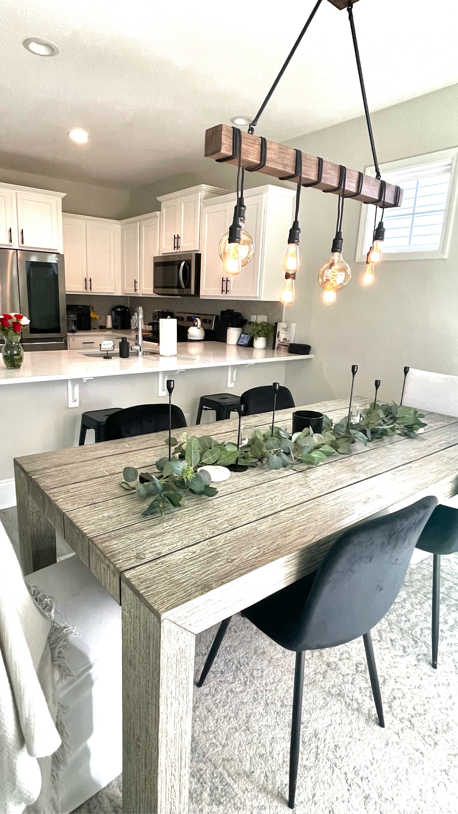My modern minimalist dining room! I love using black, white and grey, and then added the light fixture pop of wood in order to add a little warmth to the space🤍 

dining room, modern dining decor, grey dining table, black dining chairs, greenery, neutral home, modern decor, minimalist home, modern style, modern living room, living room inspiration, modern home, minimalist home decor, organic home, home styling ideas, dining room styling

#DiningRoom
#Modernhome
#NeutralHomeDecor
#Organicmodern
#Cleanhome
#Aesthetic 
#InteriorDesign 
#Modernorganic 
#Budgetfriendly 
#NeutralHome
#MinimalistHome
#Organichome
#ModernAesthetic
#neutraldecor
#modernhomedecor #modernminimalist #moderndiningroom #diningroominspo 



#LTKHome #LTKStyleTip
