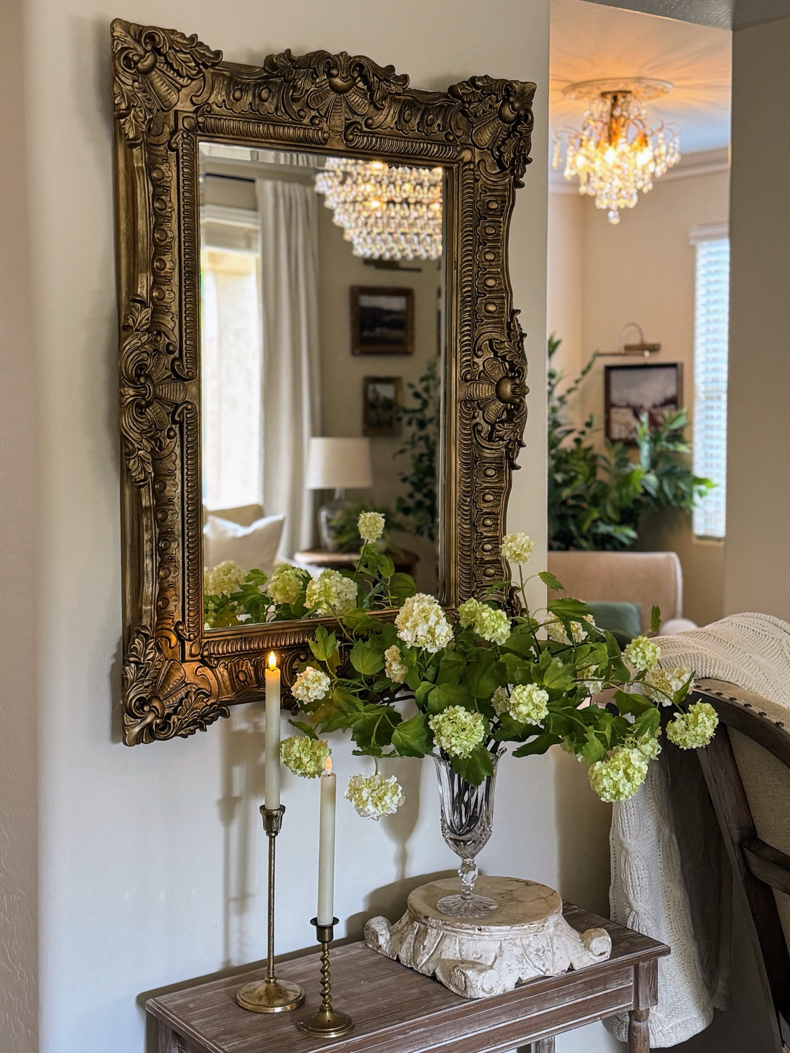 Jazz up a lonely wall with a statement mirror. 

Gold mirror, French mirror, chandelier, crystal chandelier, faux florals, snowball flowers

PS: I bought this mirror in white and spray painted it gold. See my other post for items I used to make it look vintage-y.

#LTKhome #LTKSeasonal