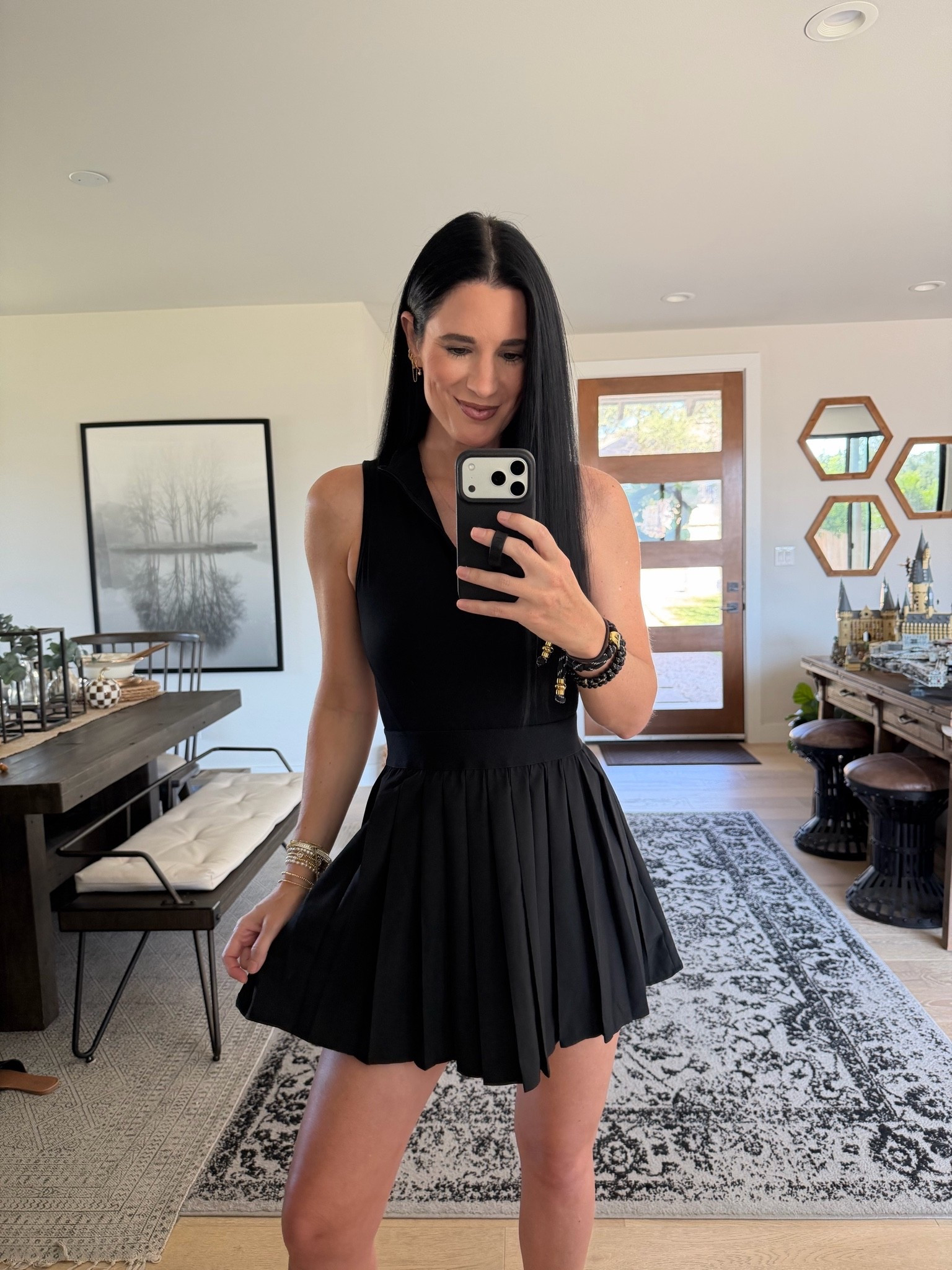 This tennis dress is so comfortable and flattering whether you’re wearing it to workout or throughout the day! I’m in a small.