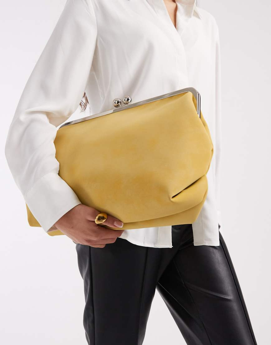 ASOS DESIGN velvet touch oversized frame clutch bag in buttermilk-Yellow | ASOS (Global)