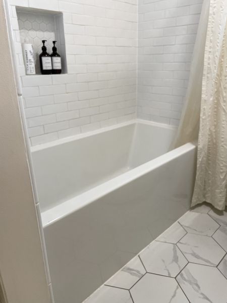 We love our deep soaking tub for our kids’ bathroom.  It has modern clean lines and is currently $300 off for Wayfair’s Labor Day sale!

Soaking tub.  White modern tub.  

#LTKFind #LTKhome #LTKsalealert