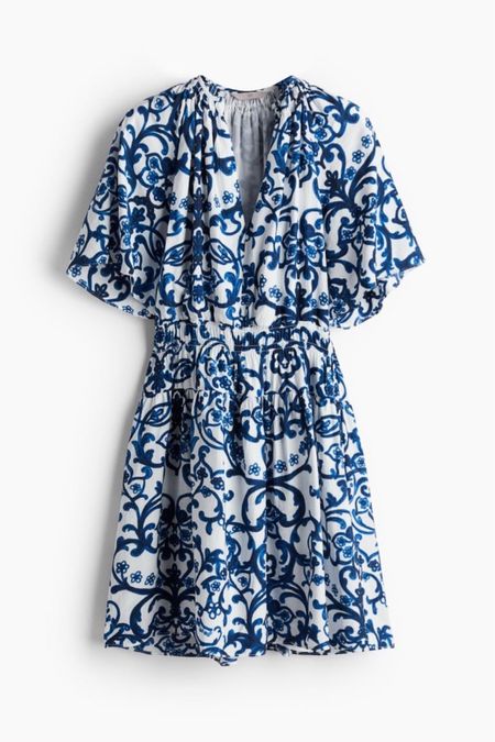 Blue and white floral mini dress 

#LTKstyletip #LTKSeasonal #LTKfindsunder50