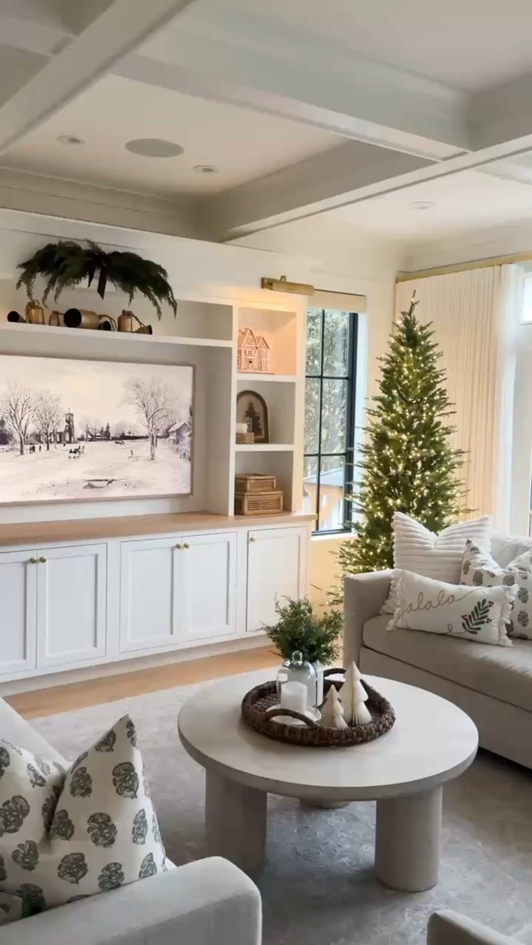 Cozy neutral living room with slim faux Christmas tree, classic green and gold holiday decor 

#LTKSeasonal #LTKHoliday #LTKHome