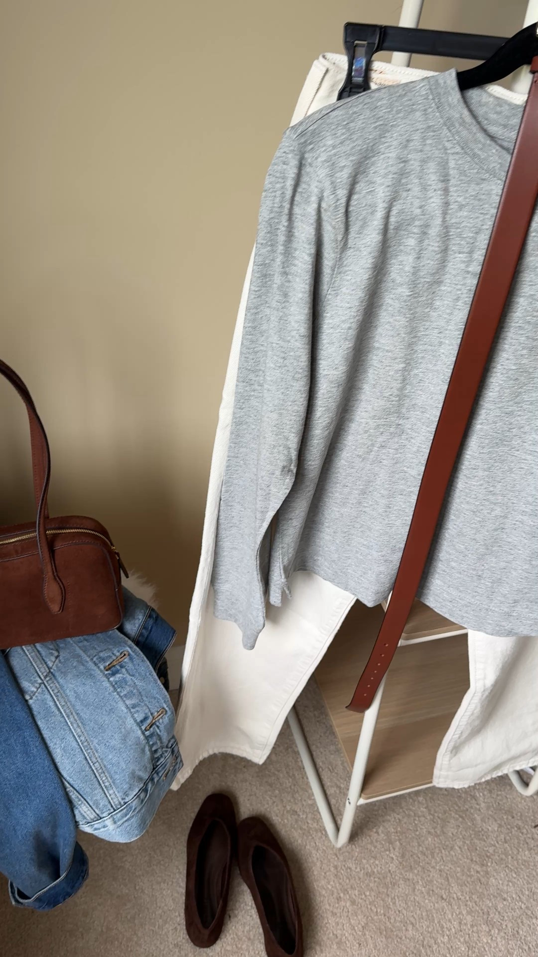 Elevated long sleeve t-shirt outfit idea for Fall. 
Pair with off-white denim, add a belt. 
Add suede accessories in rich brown tones. 
Finish with simple gold jewelry and oversized denim jacket. 
- This exact long sleeve t-shirt is all cotton and soft, with a lived-in feel. True to size for me. Currently on sale for $24. 
- Exact jeans in ecru are my current favorite Levi’s style. 
- Leather belt is a closet staple. I also have this one in black. On sale for $46  
- Chic suede flats are comfy out of the box. True to size. 
- Suede shoulder bag in a trending silhouette. This is my favorite non-designer option for the look and quality. 
- Oversized denim jacket comes in multiple washes and roomy enough to layer over sweatshirts and sweaters. 
- Versatile gold tone jewelry that matches everything. 


#LTKStyleTip #LTKItBag #LTKOver40