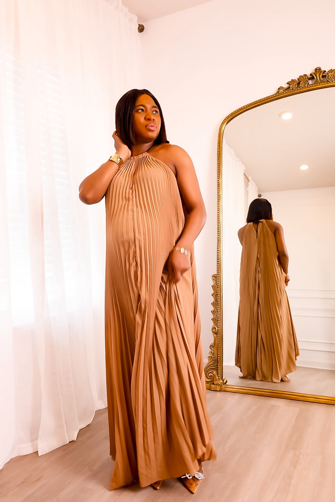 This pleated halter maxi dress is super fun! It comes in several colors and I'm wearing a size medium. It's also under $30! Find the full review on YouTube.💃🏾

#LTKbump #LTKVideo #LTKstyletip