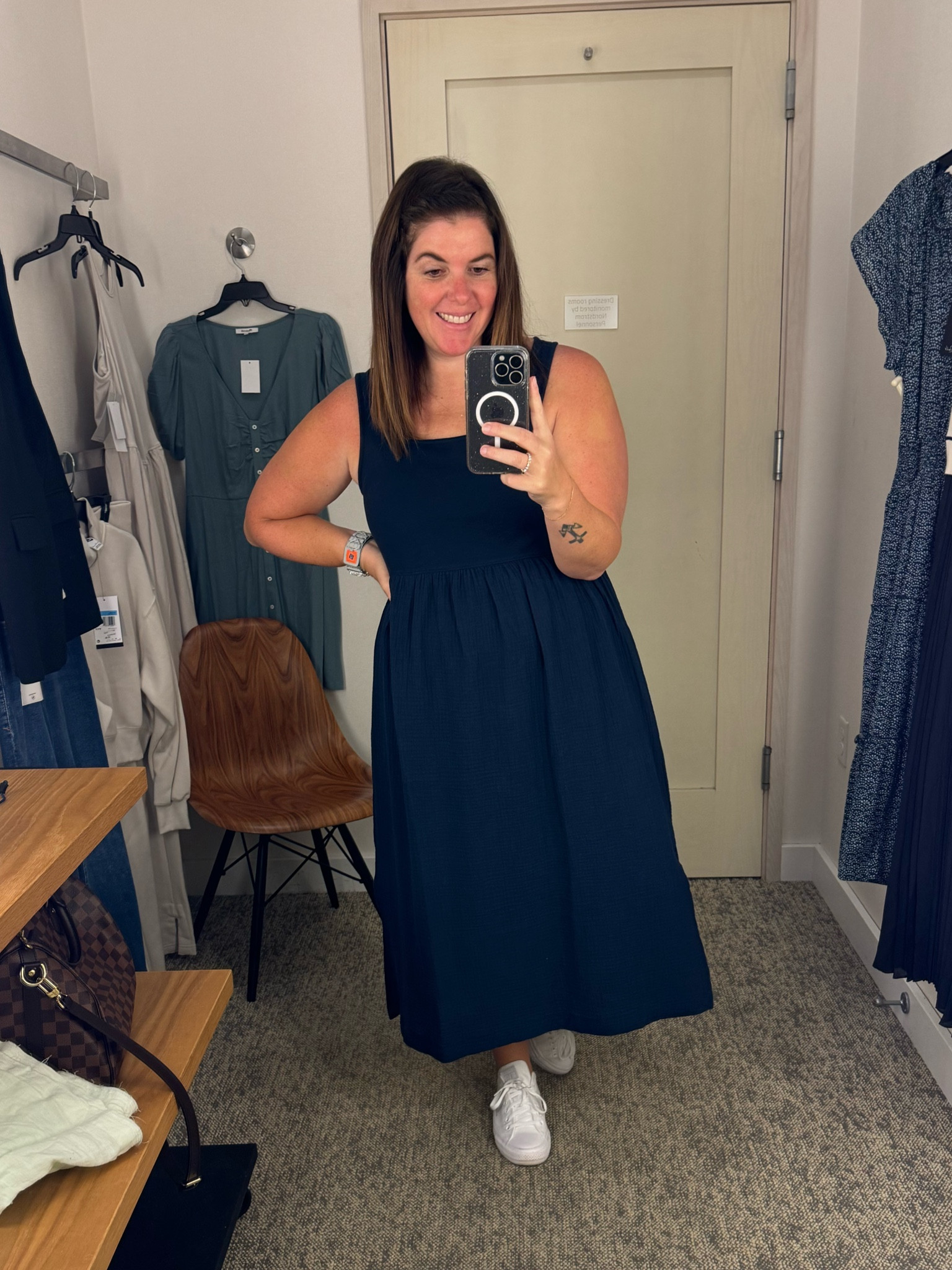 The first dress I tried on and I’m in love! The dress is Madewell, the navy blue is gorgeous and the fit of this dress is amazing! This is one you can throw in your suitcase for your summer trip and you will love it! The dress runs TTS and is on sale for $64.99!

#LTKSummerSales #LTKxNSale #LTKSaleAlert