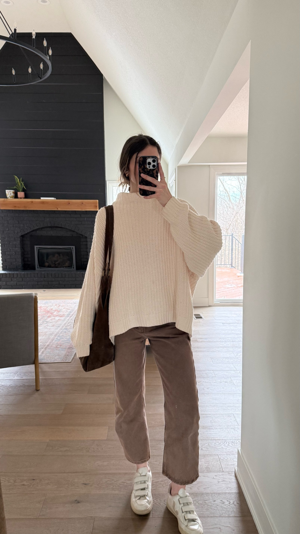 wearing an xs in sweater, fits oversized, one of my favorites I’ve had for years - few colors in stock! jeans are tts, love the brown but also come in lots of washes 

Winter outfit, brown jeans, suede bag 

#LTKSeasonal