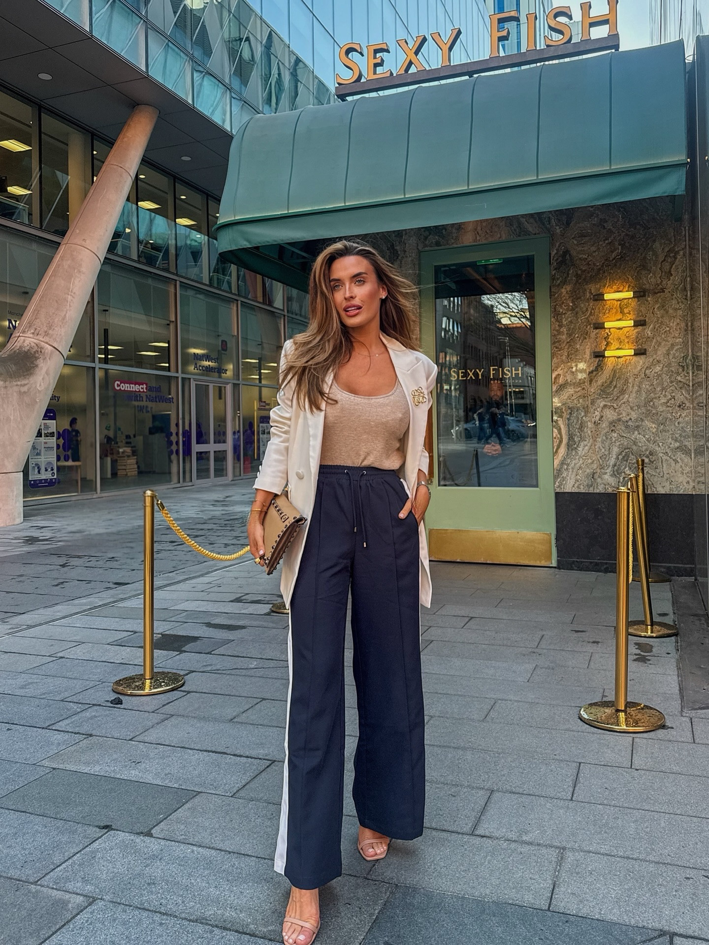 Me 🫱🏻‍🫲🏼 tracksuit bottoms + heels 

Date day in the city at the gorge @sexyfish_manchester … sushi & champers- an elite combo 🥂🍣

Ig you like my outfit too, comment SHOP & I’ll send you the dm to my post on LTK 🙋🏼‍♀️