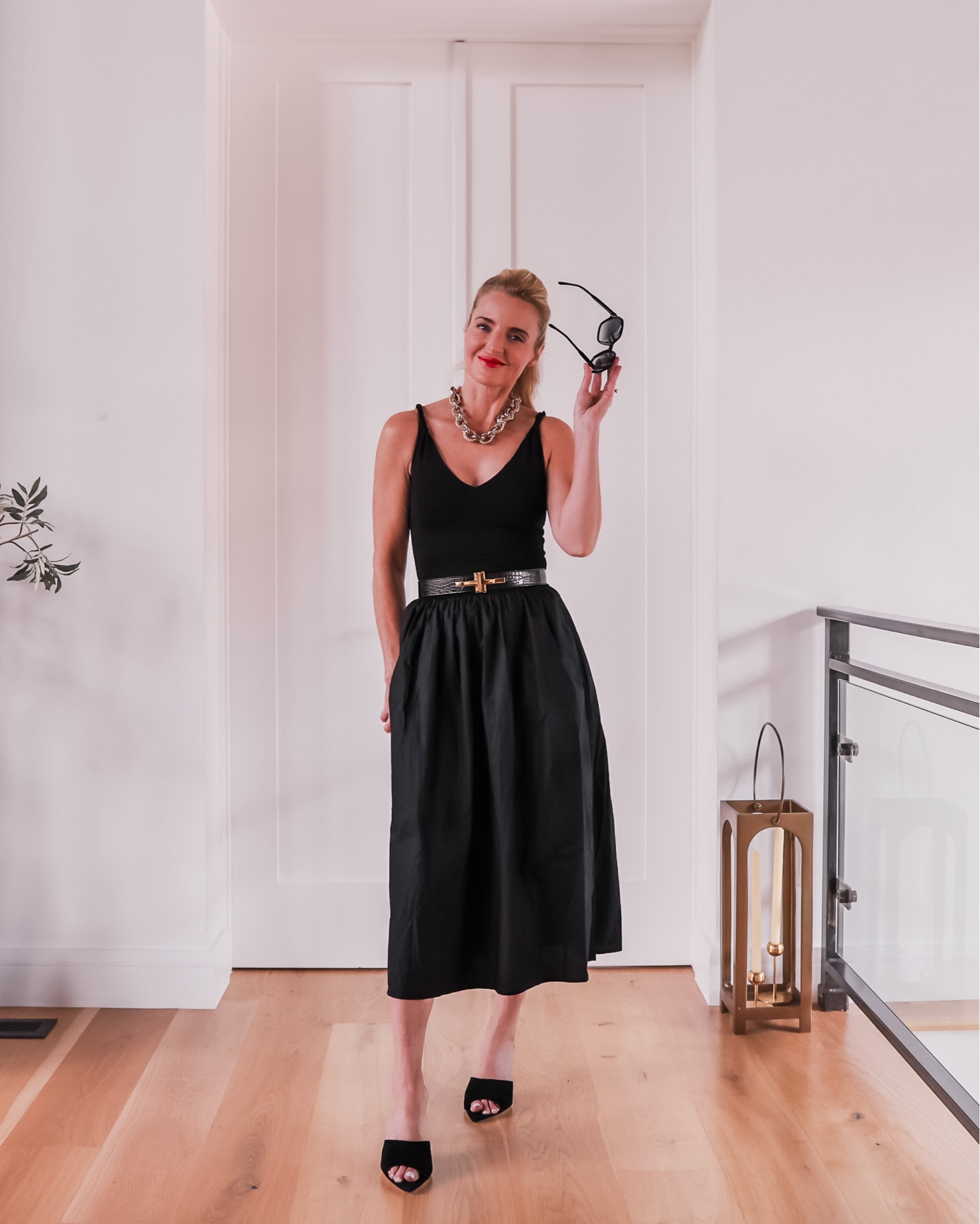 This Rails black midi dress has such a classic and flattering silhouette that is SO versatile. You could dress it up or down by either wearing heels or sneakers. A black dress like this is one of those basics I’m always talking about…a key foundation piece in your wardrobe that you will wear ALL THE TIME.

The little black dress or LBD is made of 100% cotton so it’s lightweight and breathable. It’s a pull-on style (no zippers). I love the gathered waist, full skirt, V-neckline in the front and back, and the sexy rolled tank straps. The dress even has pockets! A holy grail of LBD’s, no question. Fit runs true to size. 

~Erin xo 

#LTKStyleTip #LTKSaleAlert