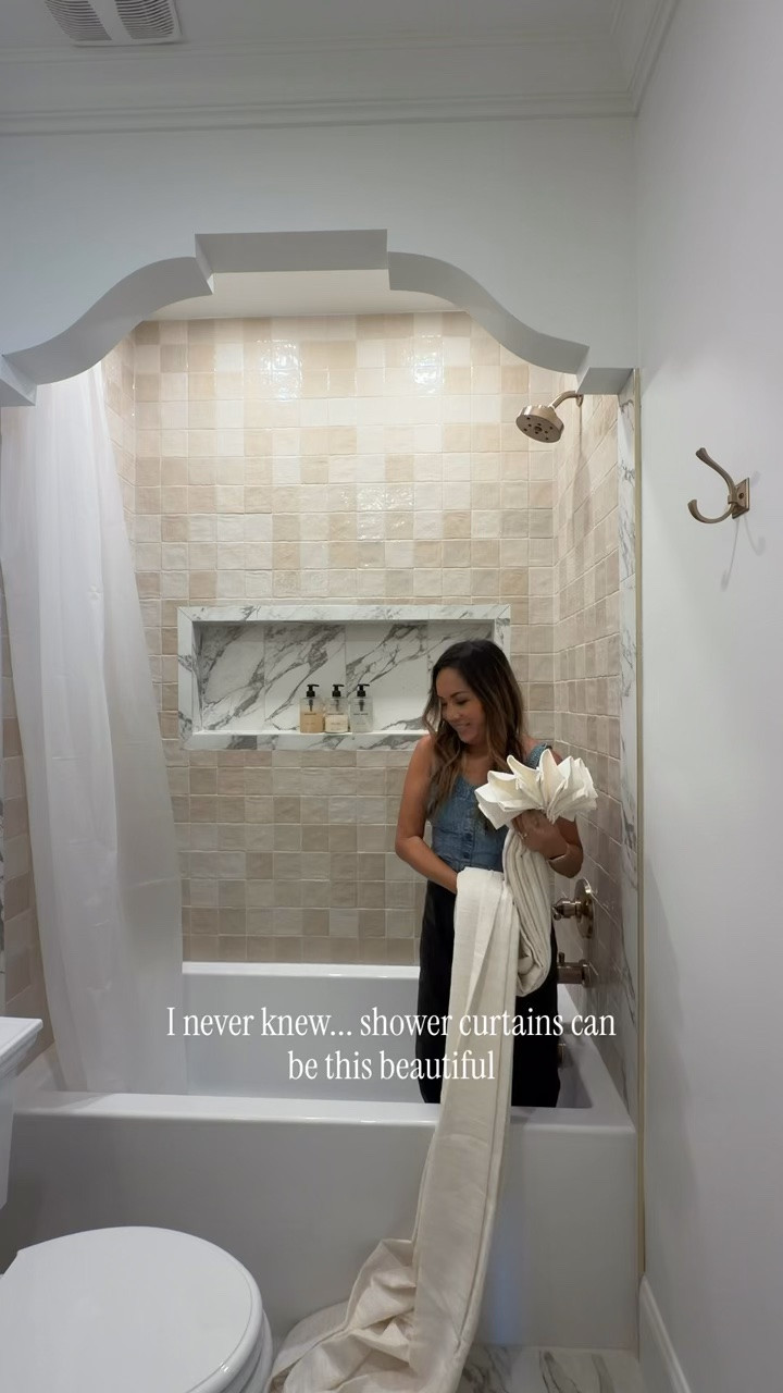 I never knew shower curtains can be this beautiful! Use my coupon code: ELPETERSON FOR 22% off for a limited time. 

Curtain details:
Custom Luxury Bathroom Curtains with Waterproof Layer
Liz, Ivory White 1908-2
Body Memory Shape
Pinch Pleat
Sally Waterproof Layer
60" wide 
95" high