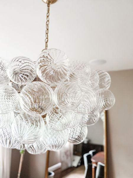 This bubble chandelier is the show stopper of our dining room! I am obsessed with the details in it 👏🏼 sharing some other budget friendly options too!

Bubble chandelier, dining room, dining room inspiration, lighting, velvet dining chairs, floor length mirror, gold mirror, traditional dining room, modern dining room

#LTKsalealert #LTKstyletip #LTKhome