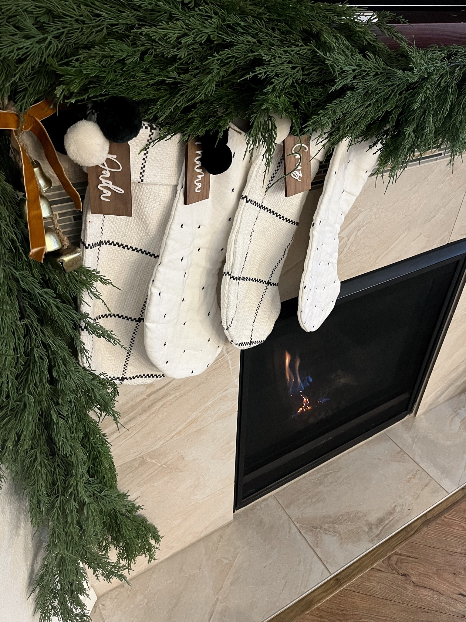 Christmas mantle with stockings and garland. Garland is a recent purchase from TJMaxx (linked the most similar I could find from Crate and Barrel - ON SALE) stockings are Hearth and Hand from 2 years ago (found on Amazon)

Amazon Christmas decor, Christmas decorations, holiday mantle, Christmas mantle inspo, stockings, target finds, stocking tags, Christmas bells, faux garland, stocking holders

#LTKSeasonal #LTKHoliday #LTKhome