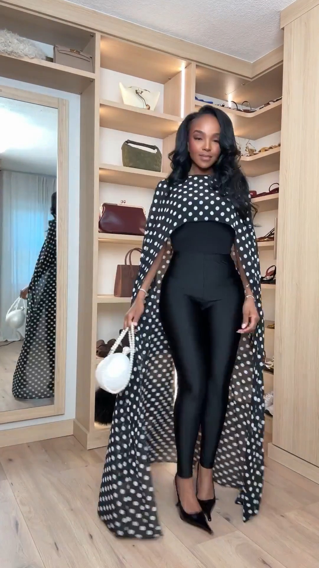 Scroll to shop this bold monochrome outfit featuring a dramatic polka dot cape layered over a sleek all-black base for a striking statement look.

Perfect for events, fashion dinners, nights out, special occasions, or when you want a standout statement outfit.



#LTKPetite #LTKgrwm #LTKvlog