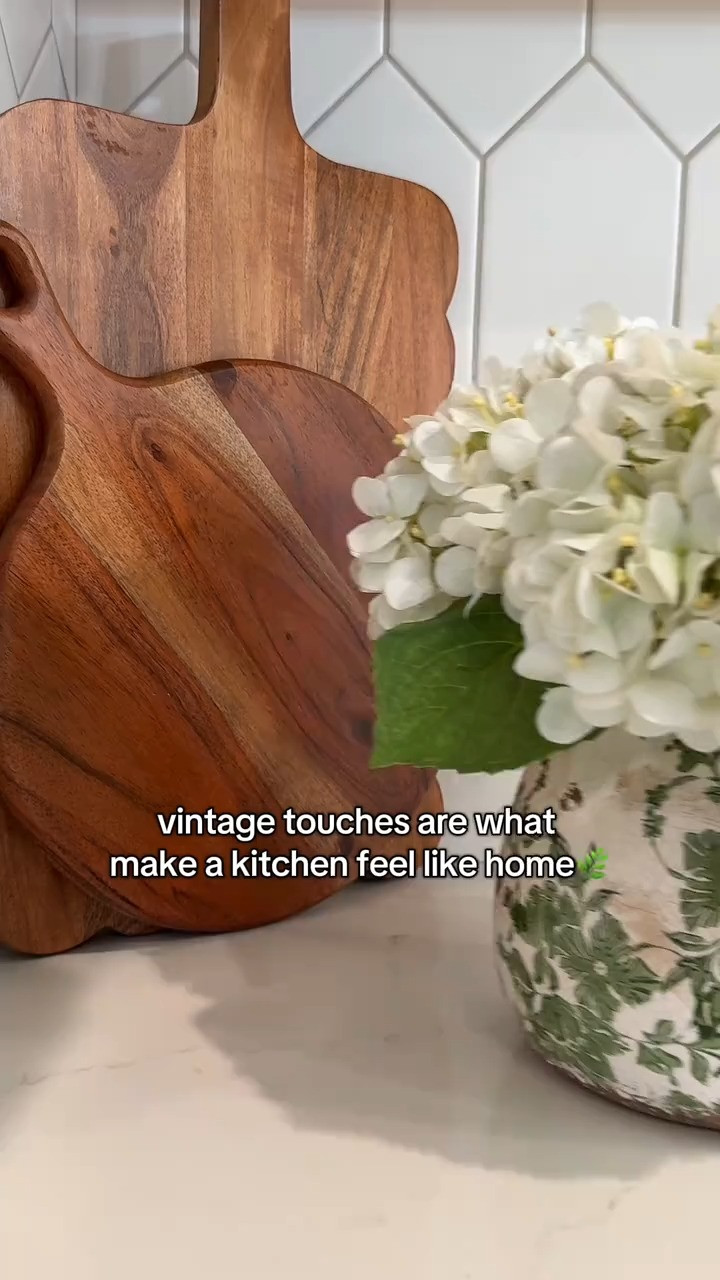 The warm wood, the vintage ceramic, the hydrangeas… this is the kind of kitchen detail that makes a house feel like home. I swapped utensils for blooms and it instantly softened the whole corner. Timeless, simple, and so full of character. 


#kitchendecor #vintagekitchen #hydrangeas #kitchenstyling #cozykitchen  

 #LTKHome