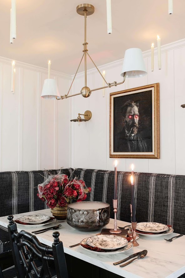 Spooky breakfast nook! The framed picture is DIY. We added lights 💀

#SpookyDecor #HalloweenDecor 

#LTKSeasonal