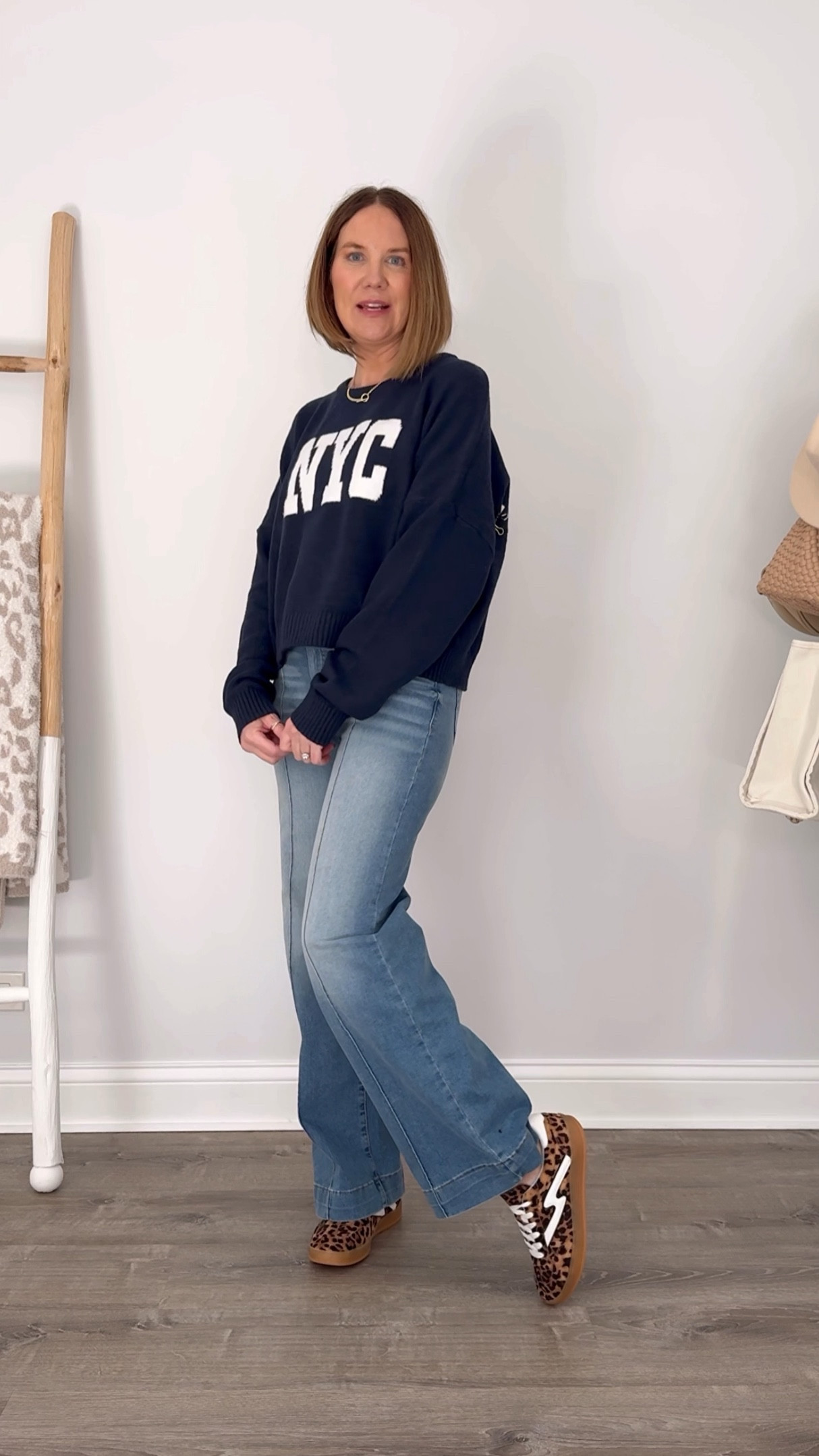 Walmart fall outfit idea
$15 graphic sweater large
$23 wide leg trouser jeans TTS
Leopard sneakers TTS

#LTKOver40 #LTKStyleTip #LTKVideo