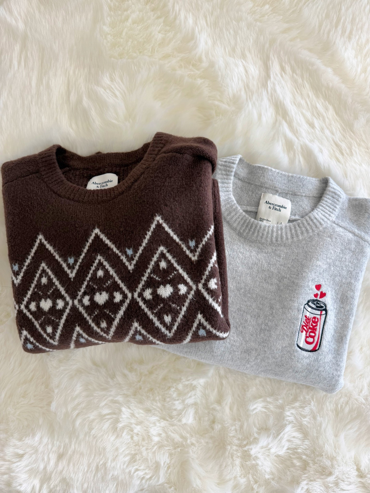 Cute and cozy sweaters from Abercrombie on sale! The gray one is perfect for all of the Diet Coke lovers. Adorable! I wear size large. 

#LTKFindsUnder100 #LTKGiftGuide #LTKSaleAlert