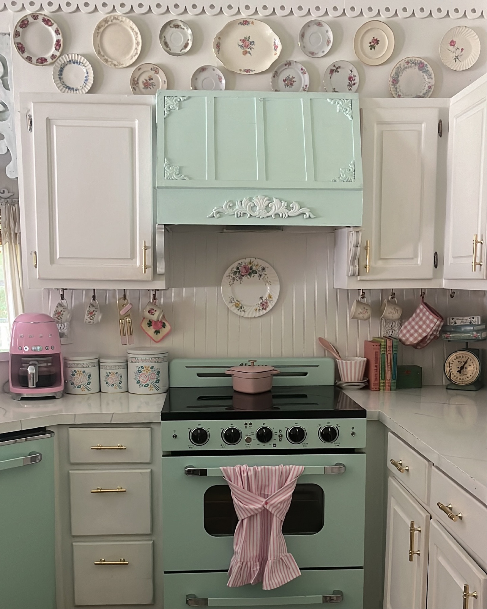 “Cozy cottage vibes in my favorite corner of the kitchen. 🌸 #CottageStyle #PastelKitchen”
