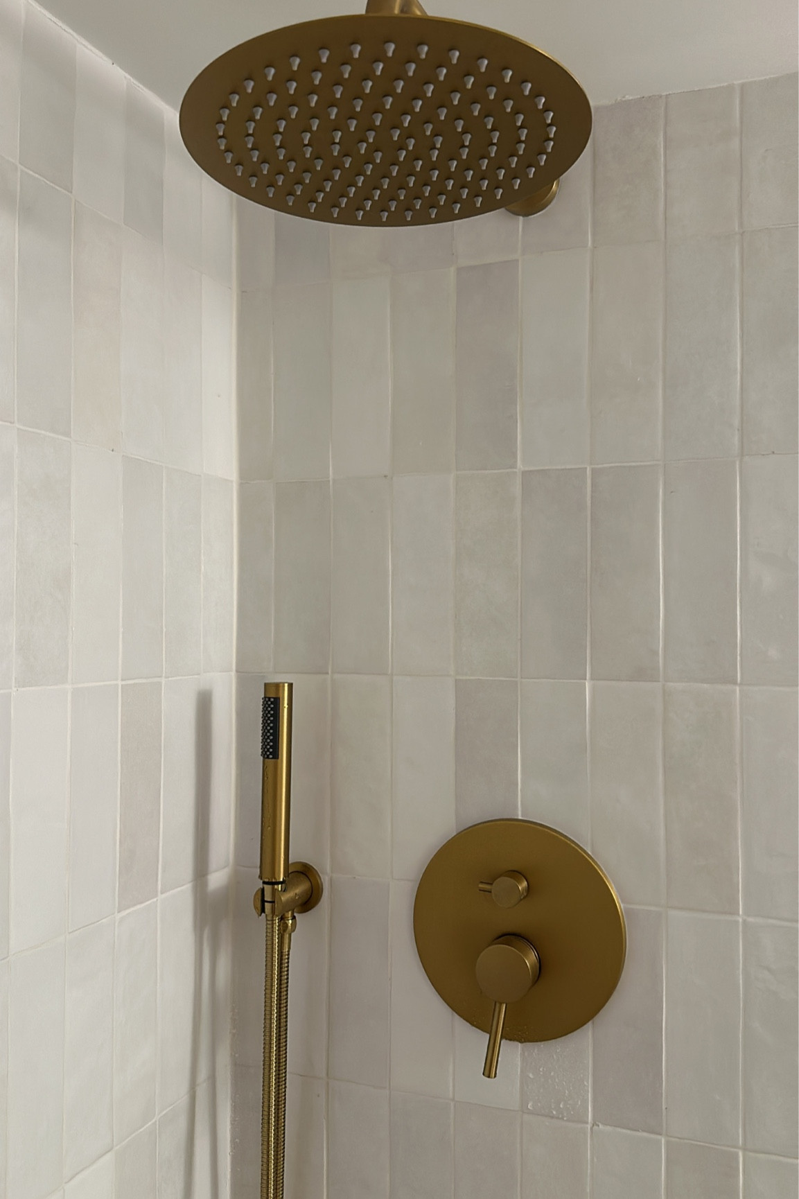 Master Bsthroom Remodel!! Obsessed with how this tile from befrosisns turned out! 
#bathroomtile #showerhead #bathroomremodel #bedrosiantils 

#LTKhome #LTKstyletip