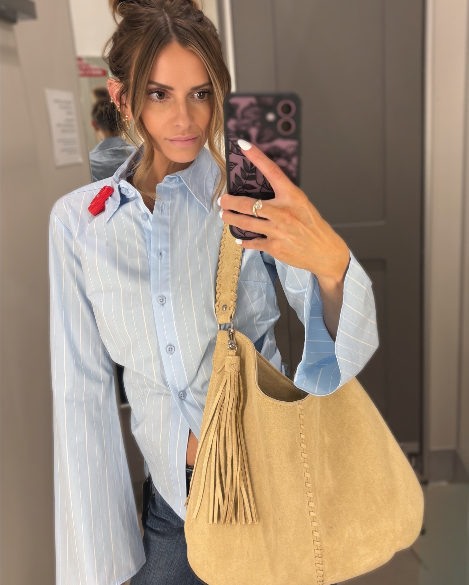 @Target spring styles are my vibe! This button down top is perfect to dress up or down  and has the cutest cinched in waist bow detail. I’m wearing it in an XS. I love these wild fable bootcut jeans that look way more expensive than they are and have the cutest back pockets. The bag is a new release from their western collection but it’s a beautiful light color for spring that has tons of room! 

#LTKSeasonal #LTKWorkwear #LTKootd