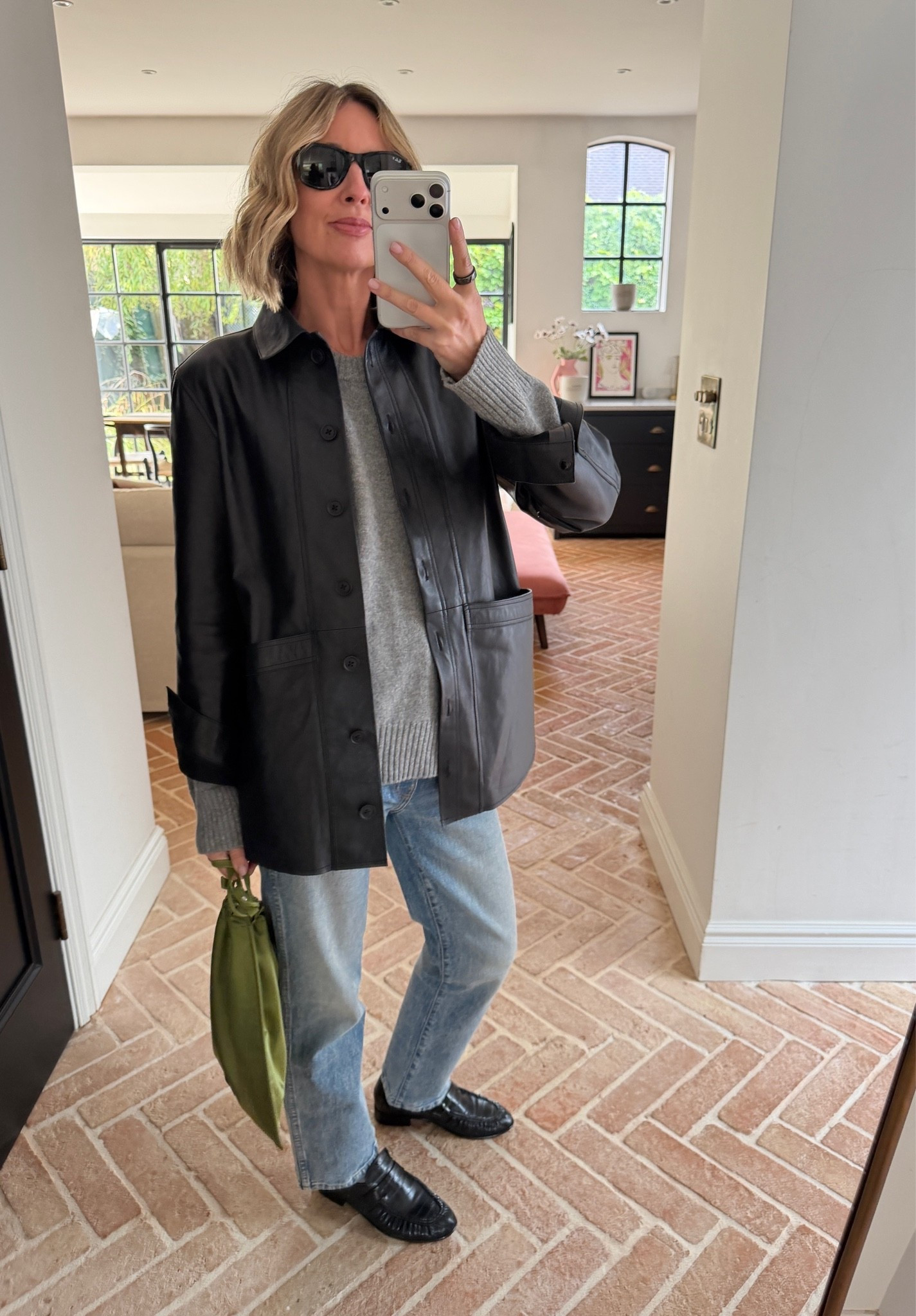 OOTD 🖤

black leather jacket, patch pocket chore jacket, grey knit sweater, light wash jeans, straight leg jeans, black leather loafers, olive green shoulder bag, black cat eye sunglasses, casual chic outfit, off duty style, autumn transitional dressing, elevated basics, quiet luxury, neutral color palette, mirror selfie ootd, ltkstyletip, ltkseasonal, ltkfindsunder100, ltkitbag