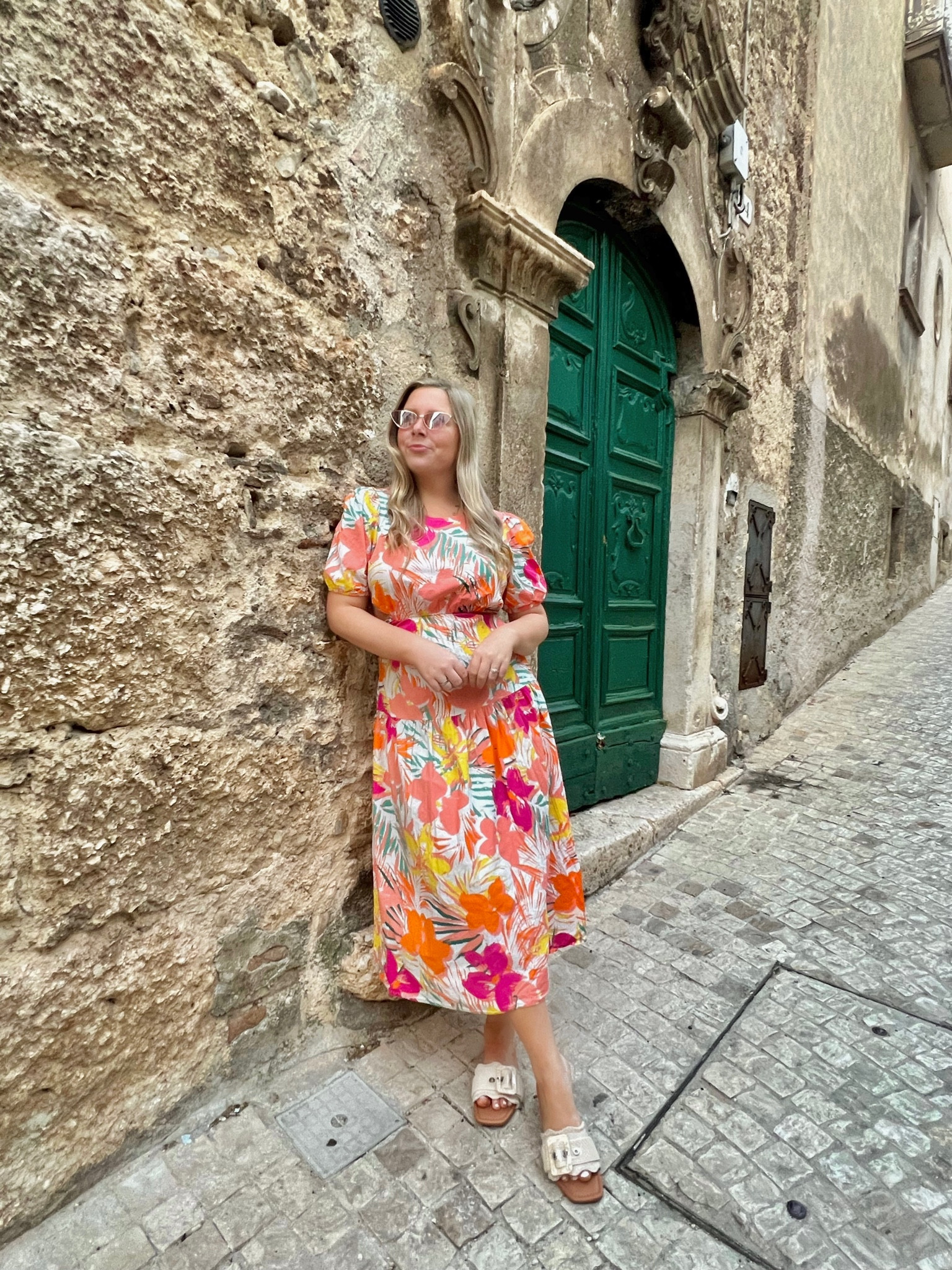 Tropical vacation outfit. Floral maxi dress. Open back dress. Sam Edelman dupe. Summer sandals. 

#LTKtravel #LTKeurope