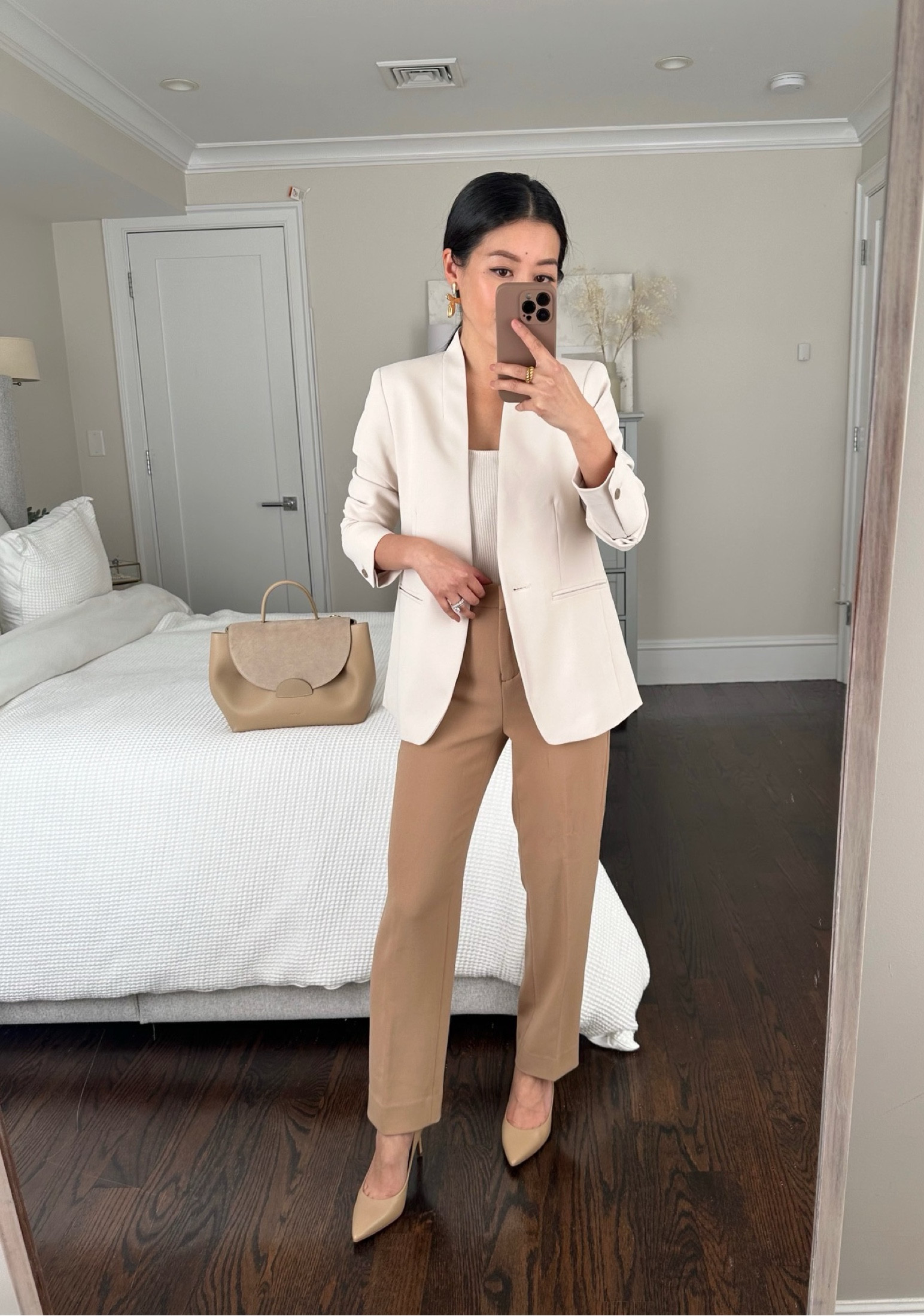 On sale: cream + camel spring work outfit 

•J.Crew Kate pants 00 petite - finally included in a sale!! Might be the first time I’ve seen the camel and black colors included. These have an updated more modern straight cut compared to my former favorite Cameron pants, and fit great off the rack with no waist gap. The petite length even works well on me for flats and sneakers too.
•Ann Taylor crepe blazer 00 petite - also has matching pants, linked below, for a full suit (pants run big)
•Reformation tank xs
•Sam Edelman heels 5.5. Great neutral heel with a very versatile cool beige tone 
•Polene bag
•Sezane earrings

// #petite neutral professional outfit for the office & meetings

#LTKunder100 #LTKstyletip #LTKworkwear
