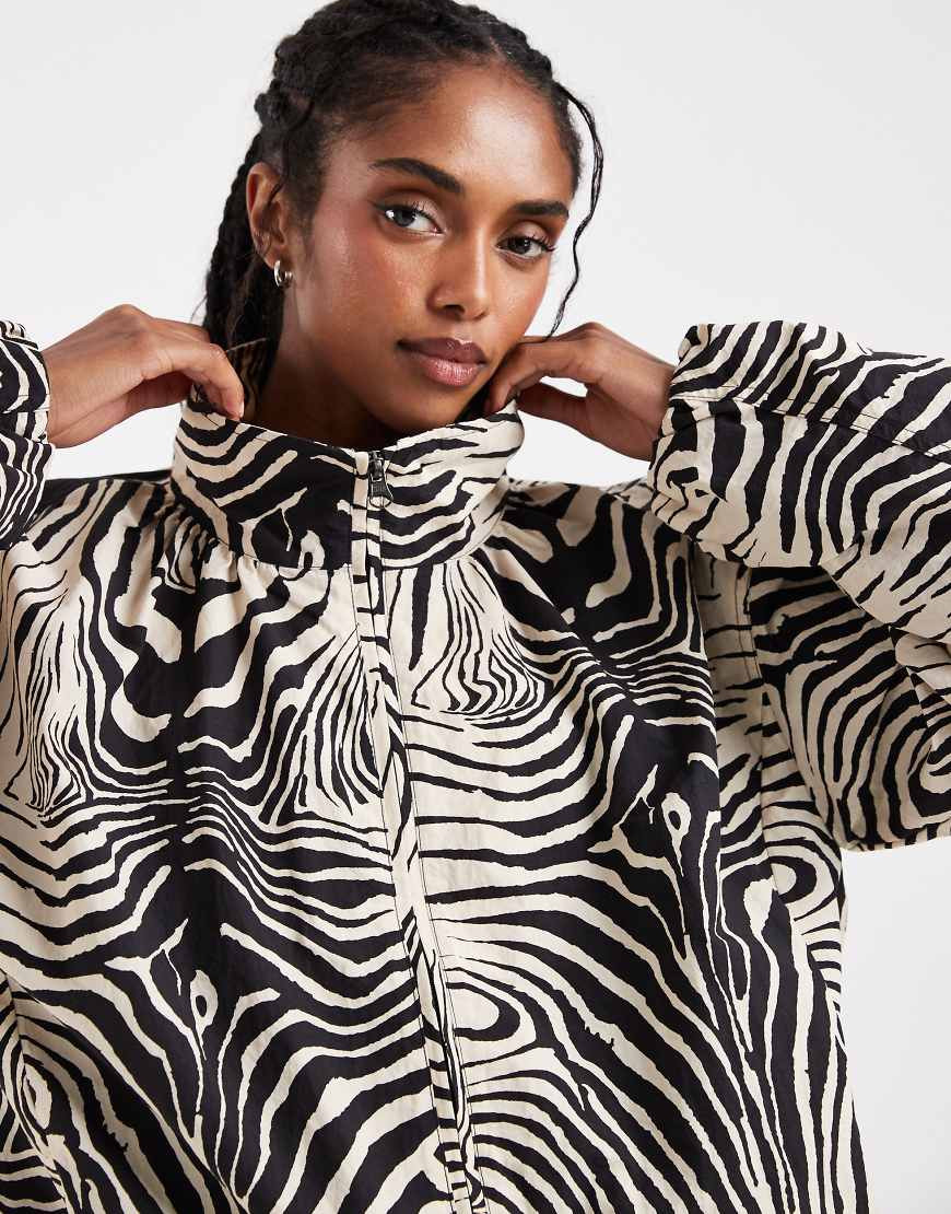 ASOS DESIGN oversized bubble hem track jacket in zebra-White | ASOS (Global)
