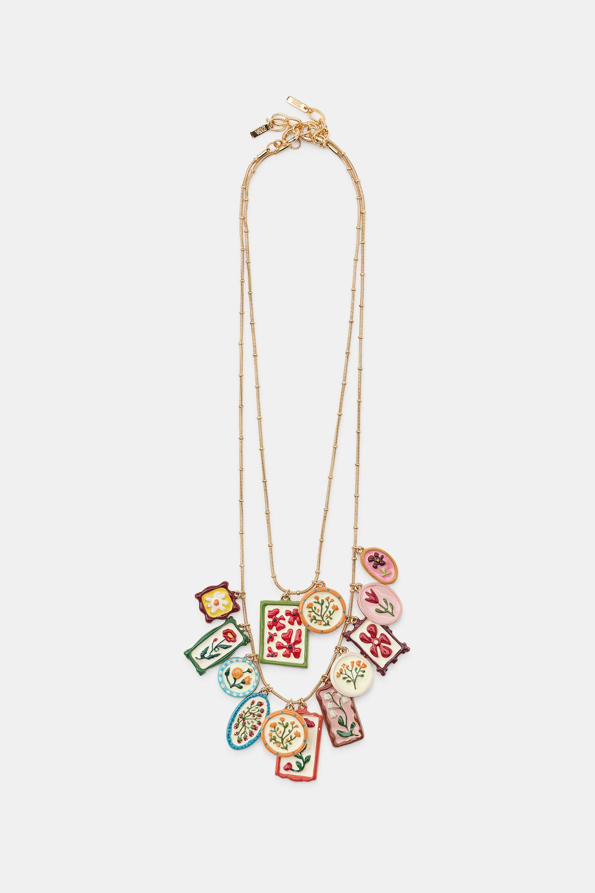 Pack of two necklaces in different lengths with metal cord and beads. Features multiple colorful ... | Zara US