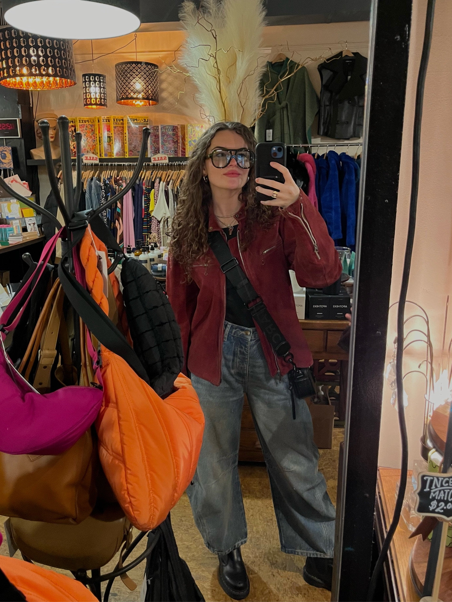 Recent outfit vintage shopping in Baltimore🪭🪭 such cute chunky aviator glasses paired with my new red suede jacket from depop, my new barrel jeans from free people, black tee, doc marten Chelsea boots, & my Marc Jacobs snapshot bag!

#LTKfindsunder100 #LTKitbag #LTKstyletip